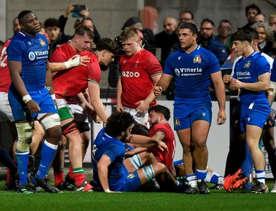 100323 - Italy U20 v Wales U20 - Under 20 Six Nations - Lucas De La Rua of Wales is congratulated after scoring a try