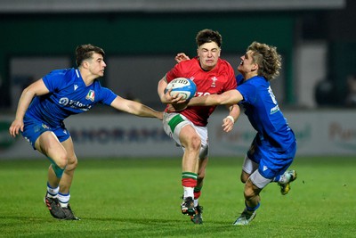 100323 - Italy U20 v Wales U20 - Under 20 Six Nations - Llien Morgan of Wales is tackled by Simone Brisighella of Italy 