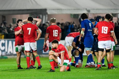 100323 - Italy U20 v Wales U20 - Under 20 Six Nations - Dejected Wales players at the end of the match