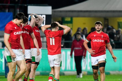 100323 - Italy U20 v Wales U20 - Under 20 Six Nations - Dejected Wales players at the end of the match