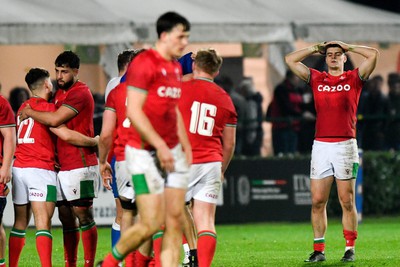 100323 - Italy U20 v Wales U20 - Under 20 Six Nations - Dejected Wales players at the end of the match