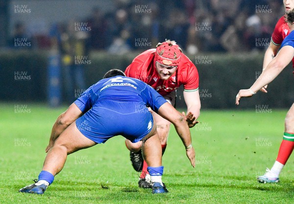 100323 - Italy U20 v Wales U20 - Under 20 Six Nations - Lewis Morgan of Wales is tackled by Giovanni Quattrini of Italy 