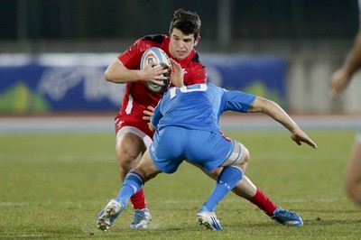 200315 - Italy U20s vs Wales U20s - RBS 6 Nations U20s -Jarrod Evans is tackled by Matteo Minozzi