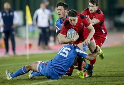 200315 - Italy U20s vs Wales U20s - RBS 6 Nations U20s -Joshua Adams is tackled by Giacomo de Santis