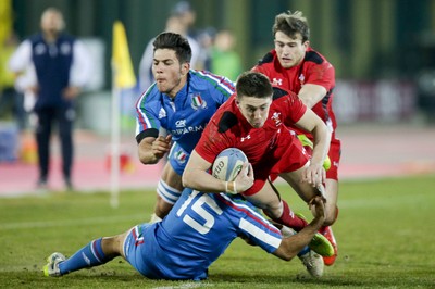 200315 - Italy U20s vs Wales U20s - RBS 6 Nations U20s -Joshua Adams is tackled by Giacomo de Santis