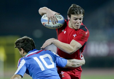 200315 - Italy U20s vs Wales U20s - RBS 6 Nations U20s -Jarrod Evans is tackled by Matteo Minozzi