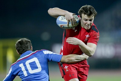 200315 - Italy U20s vs Wales U20s - RBS 6 Nations U20s -Jarrod Evans is tackled by Matteo Minozzi