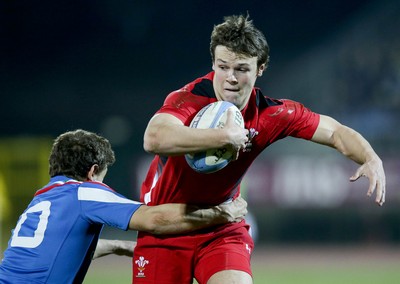 200315 - Italy U20s vs Wales U20s - RBS 6 Nations U20s -Jarrod Evans is tackled by Matteo Minozzi