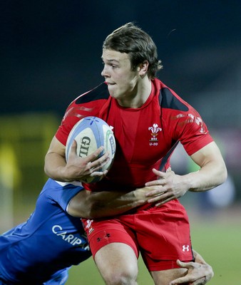 200315 - Italy U20s vs Wales U20s - RBS 6 Nations U20s -Jarrod Evans is tackled by Matteo Minozzi