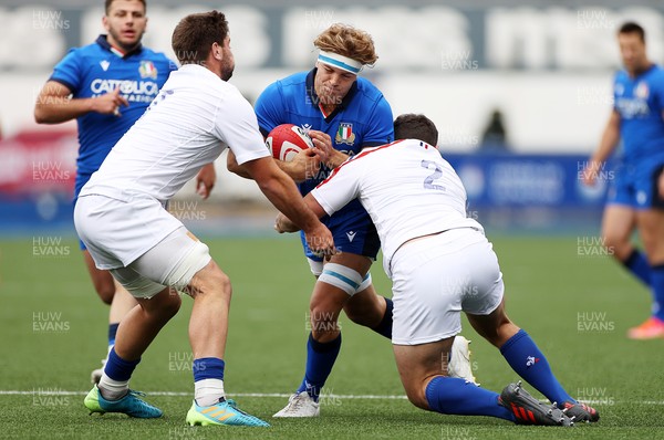 250621 - Italy U20s v France U20s - U20s 6 Nations Championship - Lorenzo Cannone of Italy is tackled by Jean-Baptiste Lachaise and Benjamin Boudou of France