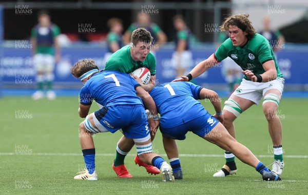 070721 - Italy U20 v Ireland U20, 2021 Six Nations U20 Championship - Harry Sheridan of Ireland is tackled by Luca Rizzoli of Italy and Ross Micheal Vintcent of Italy
