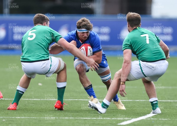 070721 - Italy U20 v Ireland U20, 2021 Six Nations U20 Championship - Ross Micheal Vintcent of Italy is tackled by Harry Sheridan of Ireland and Alex Kendellen of Ireland