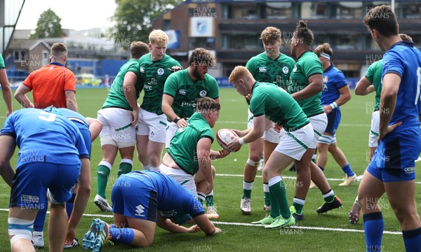 070721 - Italy U20 v Ireland U20, 2021 Six Nations U20 Championship - Eoin de Buitlear of Ireland is congratulated by team mates after  they power over to score the opening try
