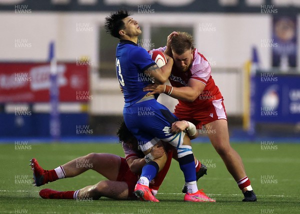 190621 - Italy U20s v Wales U20s - U20s 6 Nations Championship - Tommaso Menoncello of Italy is tackled by Garyn Phillips of Wales