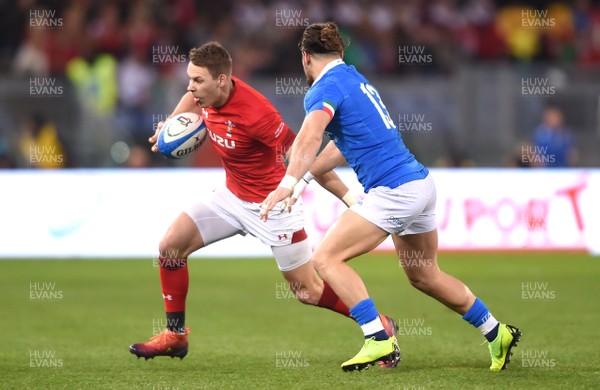 090219 - Italy v Wales - Guinness Six Nations - Liam Williams of Wales is tackled by Michele Campagnaro of Italy