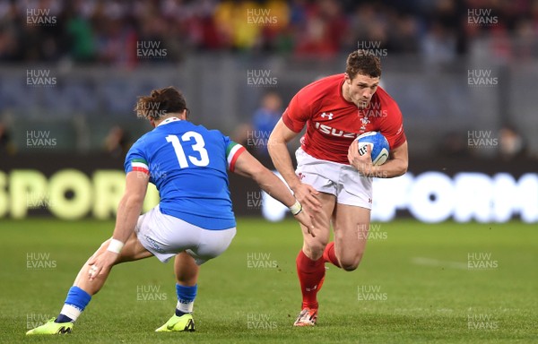 090219 - Italy v Wales - Guinness Six Nations - Jonah Holmes of Wales is tackled by Michele Campagnaro of Italy