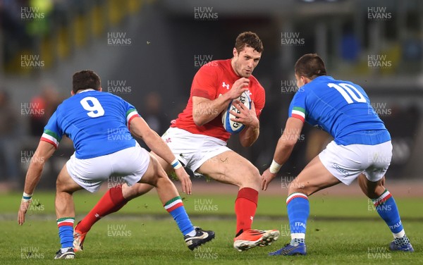 090219 - Italy v Wales - Guinness Six Nations - Jonah Holmes of Wales takes on Tommaso Allan of Italy