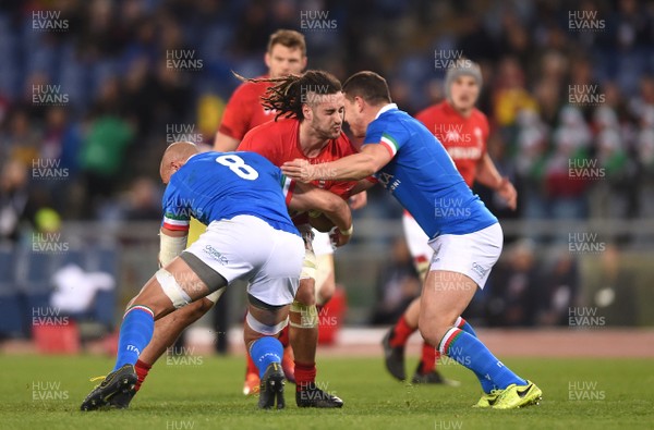 090219 - Italy v Wales - Guinness Six Nations - Josh Navidi of Wales is tackled by Sergio Parisse and Luca Morisi of Italy