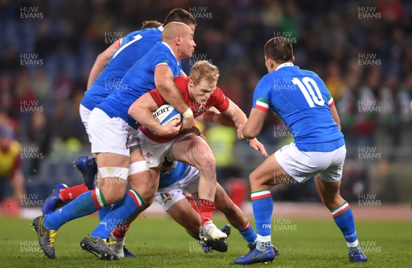 090219 - Italy v Wales - Guinness Six Nations - Aled Davies of Wales is tackled by Sergio Parisse of Italy