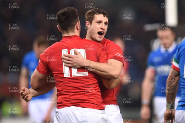 090219 - Italy v Wales - Guinness Six Nations - Owen Watkin of Wales celebrates scoring try with Jonah Holmes (right)