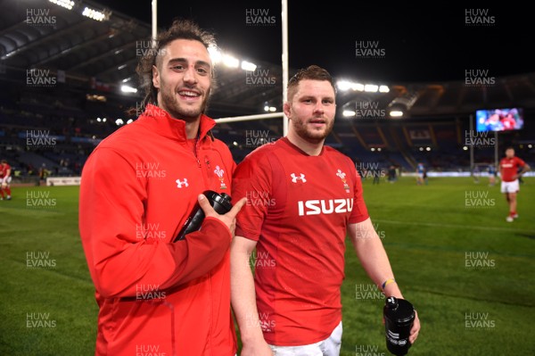 090219 - Italy v Wales - Guinness Six Nations - Josh Navidi and Thomas Young of Wales celebrates at the end of the game
