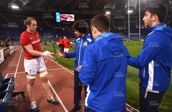 090219 - Italy v Wales - Guinness Six Nations - Alun Wyn Jones of Wales gives his shorts and socks to ball boys at the end of the game