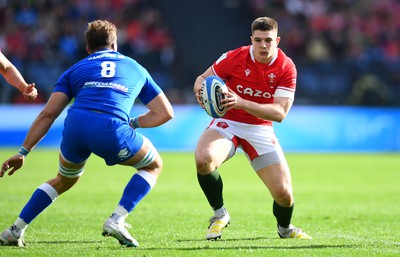 110323 - Italy v Wales - Guinness Six Nations - Joe Hawkins of Wales takes on Lorenzo Cannone of Italy