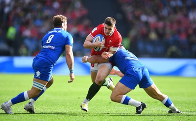 110323 - Italy v Wales - Guinness Six Nations - Joe Hawkins of Wales takes on Lorenzo Cannone and Michele Lamaro of Italy