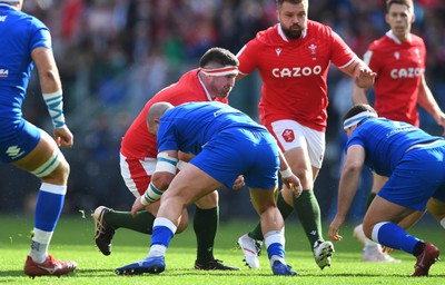 110323 - Italy v Wales - Guinness Six Nations - Wyn Jones of Wales takes on Simone Ferrari of Italy