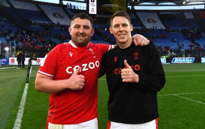 110323 - Italy v Wales - Guinness Six Nations - Wyn Jones and Liam Williams of Wales at the end of the game