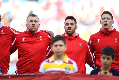 110323 - Italy v Wales - Guinness Six Nations - Tommy Reffell and Rhys Webb during the anthems