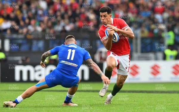 110323 - Italy v Wales - Guinness Six Nations - Rio Dyer of Wales is tackled by Pierre Bruno of Italy