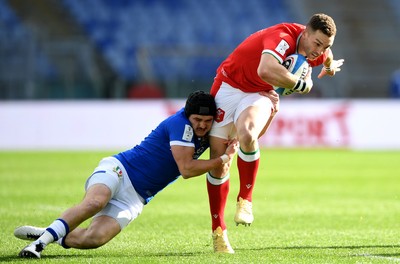 130321 - Italy v Wales - Guinness Six Nations - George North of Wales is tackled by Carlo Canna of Italy