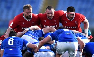 130321 - Italy v Wales - Guinness Six Nations - Tomas Francis, Ken Owens and Wyn Jones of Wales prepare for scrum