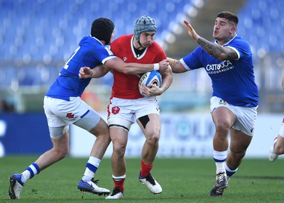 130321 - Italy v Wales - Guinness Six Nations - Jonathan Davies of Wales looks for a way through