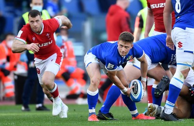 130321 - Italy v Wales - Guinness Six Nations - Stephen Varney of Italy gets the ball away