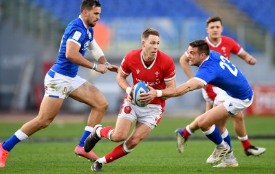 130321 - Italy v Wales - Guinness Six Nations - Liam Williams of Wales gets past Edoardo Padovani of Italy