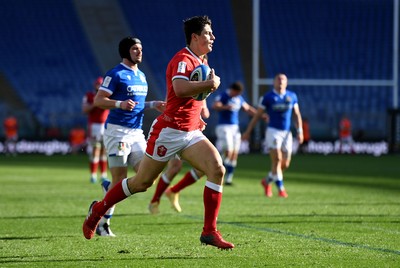 130321 - Italy v Wales - Guinness Six Nations - Louis Rees-Zammit of Wales breaks through