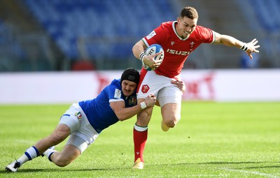 130321 - Italy v Wales - Guinness Six Nations - George North of Wales is tackled by Carlo Canna of Italy