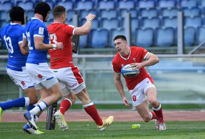 130321 - Italy v Wales - Guinness Six Nations - Josh Adams of Wales celebrates scoring a try