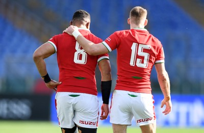 130321 - Italy v Wales - Guinness Six Nations - Taulupe Faletau of Wales gets an arm round the shoulder from Liam Williams after he scores a try