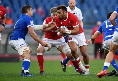 130321 - Italy v Wales - Guinness Six Nations - Willis Halaholo of Wales is tackled by Johan Meyer of Italy