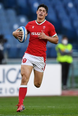 130321 - Italy v Wales - Guinness Six Nations - Louis Rees-Zammit of Wales runs in to score a try after intercepting the ball