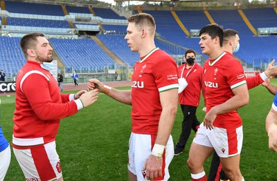 130321 - Italy v Wales - Guinness Six Nations - Wyn Jones and Liam Williams of Wales at full time