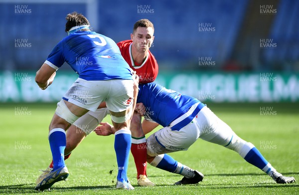 130321 - Italy v Wales - Guinness Six Nations - George North of Wales is tackled by David Sisi and Michele Lamaro of Italy