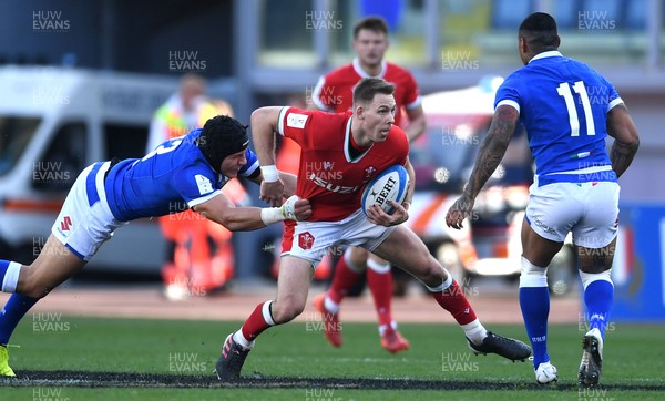 130321 - Italy v Wales - Guinness Six Nations - Liam Williams of Wales is tackled by Juan Ignacio Brex of Italy