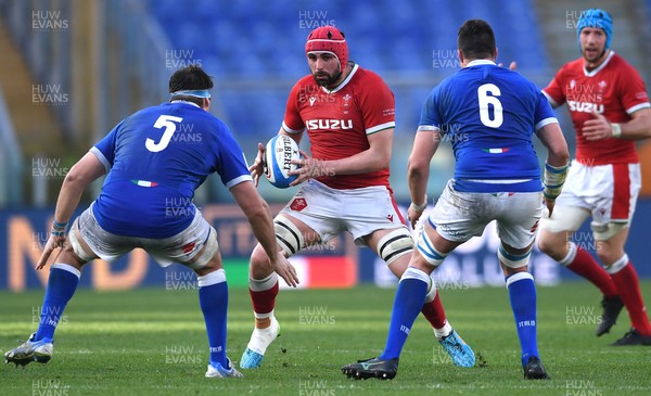 130321 - Italy v Wales - Guinness Six Nations - Cory Hill of Wales takes on David Sisi and Sebastian Negri of Italy