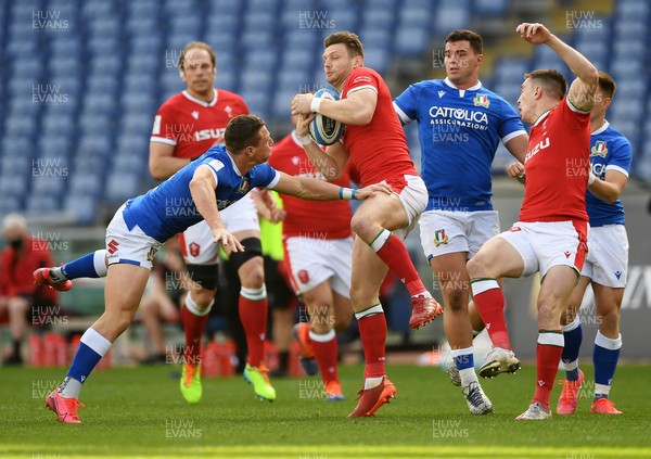 130321 - Italy v Wales - Guinness Six Nations - Dan Biggar of Wales and Paolo Garbisi of Italy go up for the ball
