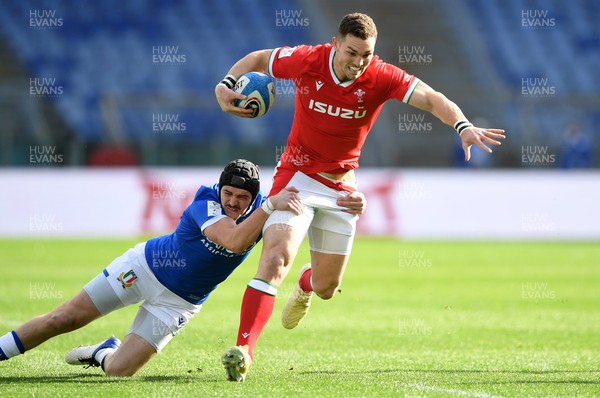 130321 - Italy v Wales - Guinness Six Nations - George North of Wales is tackled by Carlo Canna of Italy
