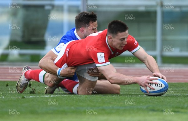 130321 - Italy v Wales - Guinness Six Nations - Josh Adams of Wales scores a try